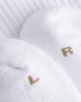 Cuera 2-pack Cuera Padel Socks in White/Walnut, neck label and care tag detail