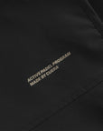 Cuera Active Gilet in Black, neck label and care tag detail