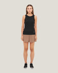 Model wearing Cuera Active Rib Tank Top in Black, front studio view