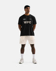 Model wearing Cuera Active WPC Light Weight T-Shirt in Black, front studio view