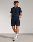 Model wearing Cuera Breathe Active Unifrom in Navy, front studio view