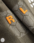 Cuera Oncourt Grip Sock in Army, neck label and care tag detail