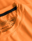 Cuera Oncourt LS Layer T-Shirt in Orange, neck label and care tag detail