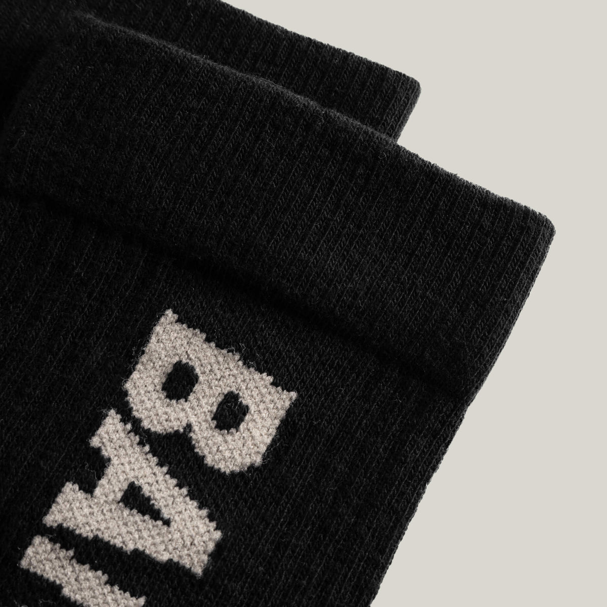 Cuera 2-pack Bandeja Padel Socks in Black/Sand, logo print detail
