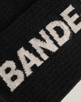 Cuera 2-pack Bandeja Padel Socks in Black/Sand, logo print detail