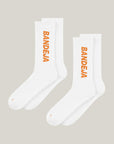 Cuera 2-pack Bandeja Padel Socks in White/Orange, flat lay front view