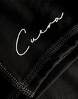 Cuera Active Biker Tights Hidden Seem in Black, logo print detail