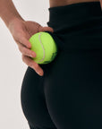 Model wearing Cuera Active Biker Tights Hidden Seem in Black, close-up detail on model
