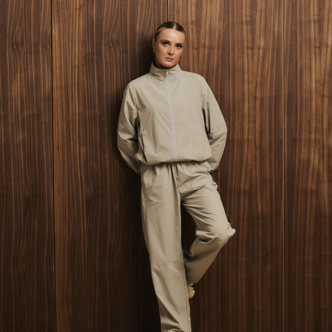 Cuera Active Cuera Short Jacket in Taupe, neck label and care tag detail