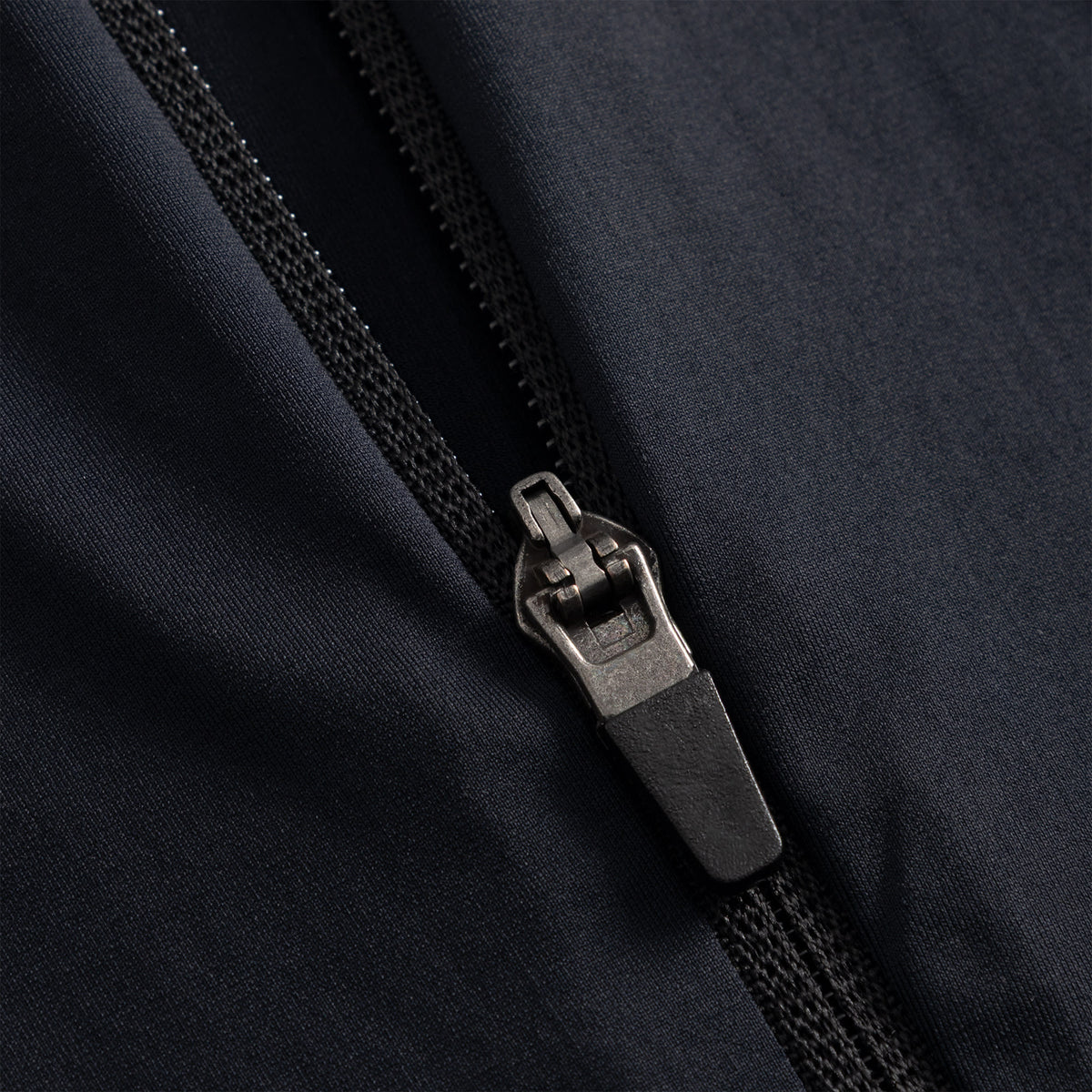 Cuera Active Cuera Zip Cardigan in Black, flat lay back view