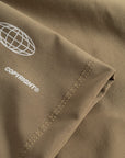 Cuera Womens Active Globe Shorts in Walnut, logo print detail