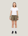Woman wearing Cuera Womens Active Globe Shorts in Walnut, front studio view