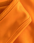 Strap and binding detail of Cuera Active Made Bra in Orange