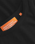 Cuera Active Rib Tank Top in Black, neck label and care tag detail