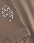 Cuera Flame Light Weight Oversized Tank Top in Walnut, logo print detail