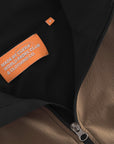 Cuera Active Track Jacket in Black / Walnut, neck label and care tag detail