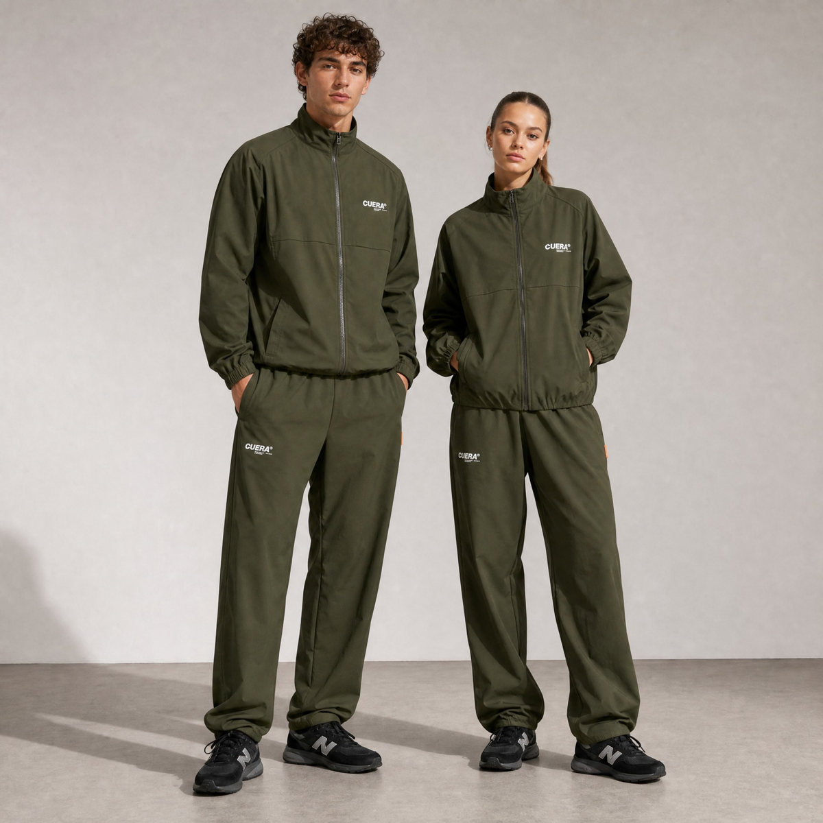 Model wearing Cuera Active Tracksuit Army 2.0 Bundle, front studio view