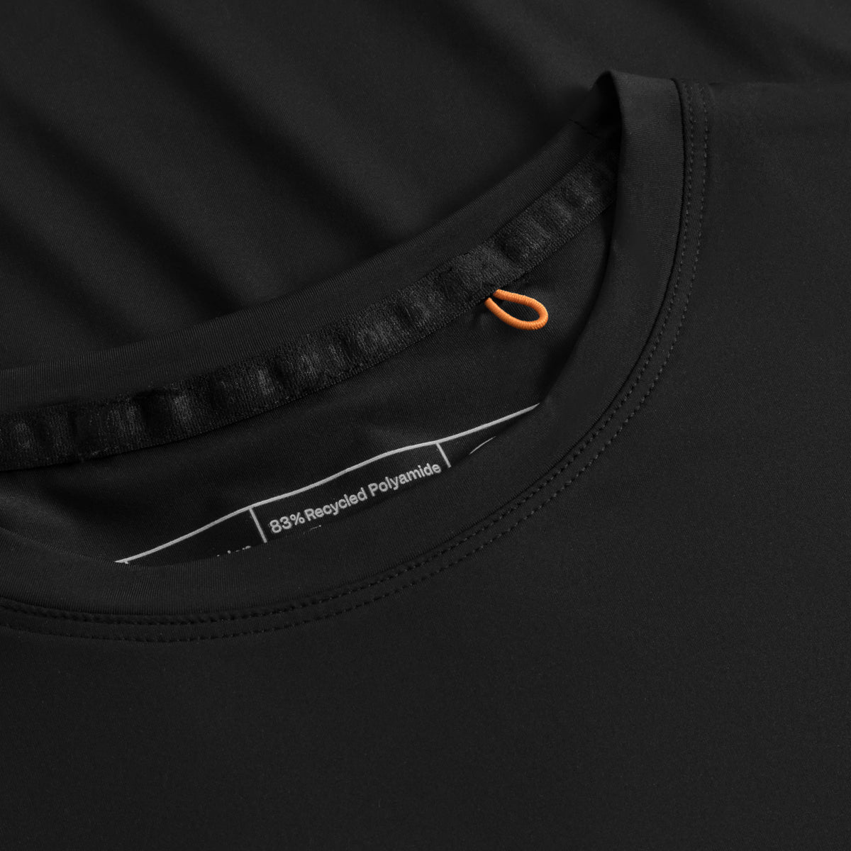 Cuera Active WPC Light Weight T-Shirt in Black, neck label and care tag detail