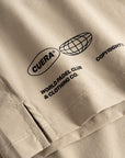 Cuera Mens Active Globe Shorts in Sand, logo print detail