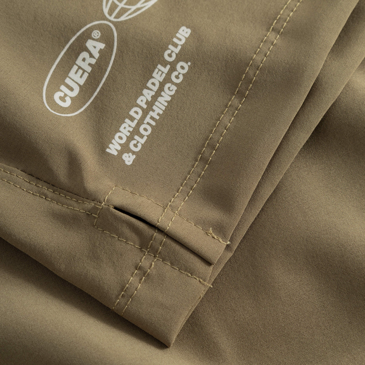 Cuera Mens Active Globe Shorts in Walnut, logo print detail