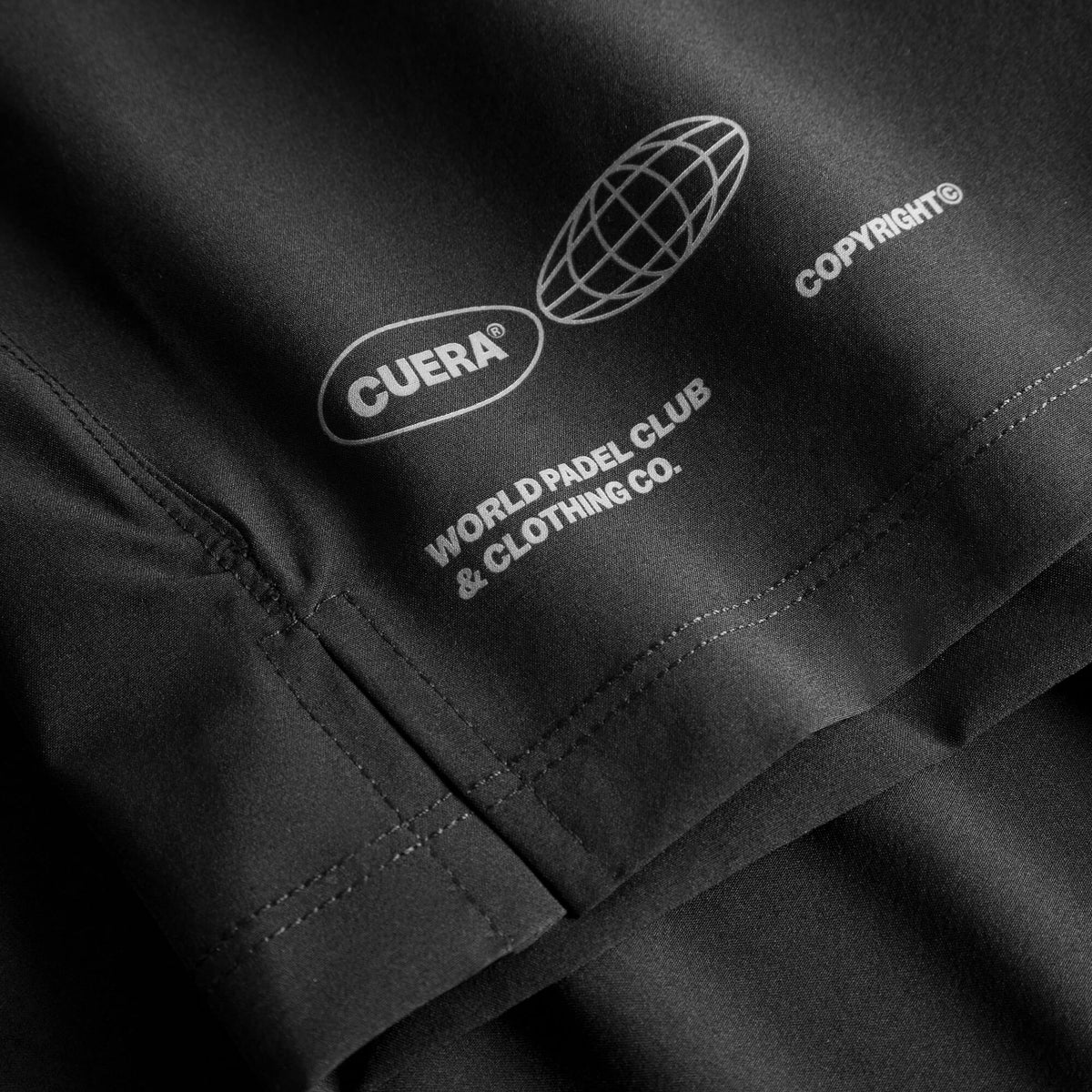Cuera Men's Active Globe Shorts in Black, flat lay back view