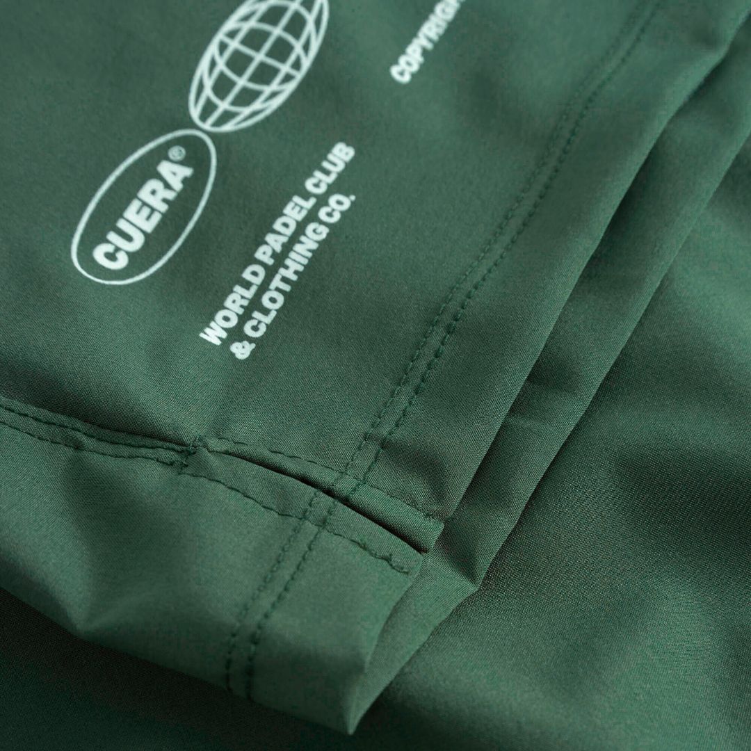 Cuera Mens Active Globe Shorts in Court Green, logo print detail