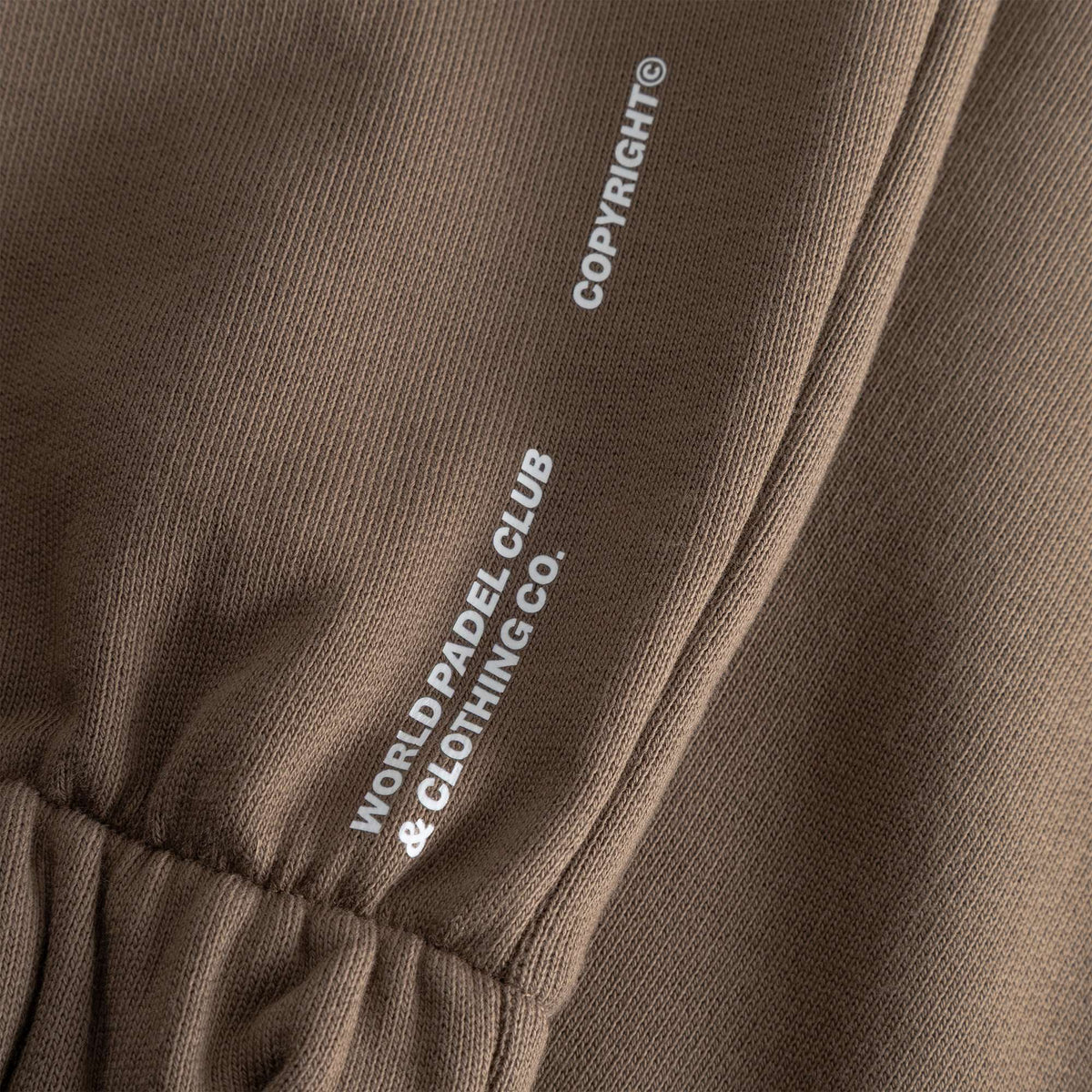 Cuera Offcourt Cuera Sweat Pants in Walnut, logo print detail
