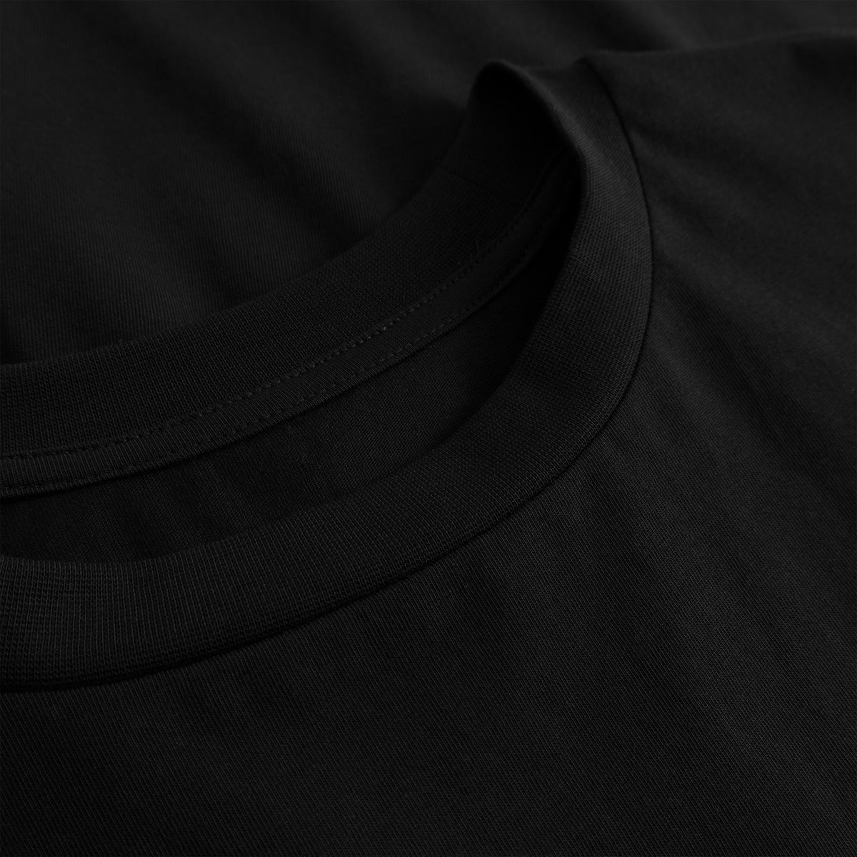 Cuera Offcourt Legacy Short Sleeve in Black, neck label and care tag detail