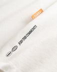 Cuera Offcourt Logo Long Sleeve in Off White w. Black, neck label and care tag detail