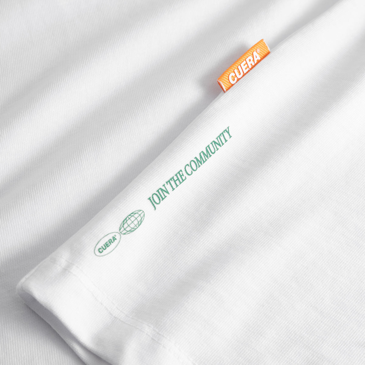 Cuera Offcourt Logo Long Sleeve in White w. Green, neck label and care tag detail