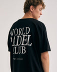 Model wearing Cuera Offcourt WPC T-Shirt in Black, back studio view