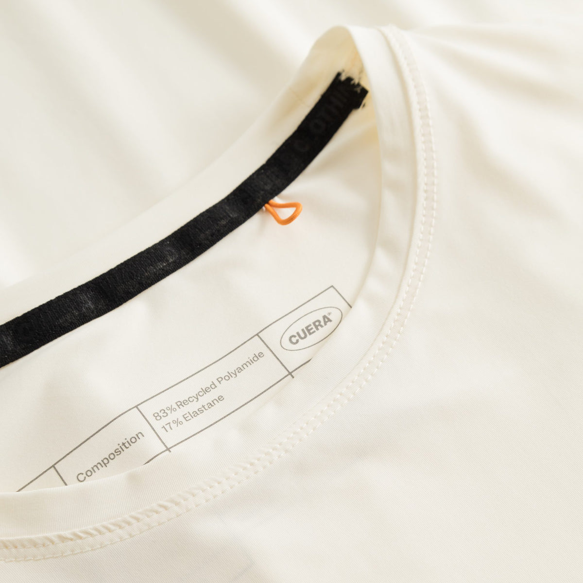 Cuera Oncourt Airy Logo T-Shirt in Off White, neck label and care tag detail