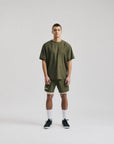 Model wearing Cuera Oncourt Breathe T-Shirt in Army, front studio view