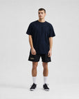 Model wearing Cuera Oncourt Breathe T-Shirt in Navy, front studio view