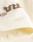 Cuera Oncourt Compression Sleeve in Off White, fabric detail
