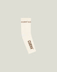 Cuera Oncourt Compression Sleeve in Off White, flat lay front view