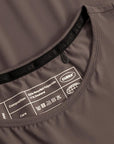 Cuera Oncourt Cropped Tank Top in Dark Brown, neck label and care tag detail