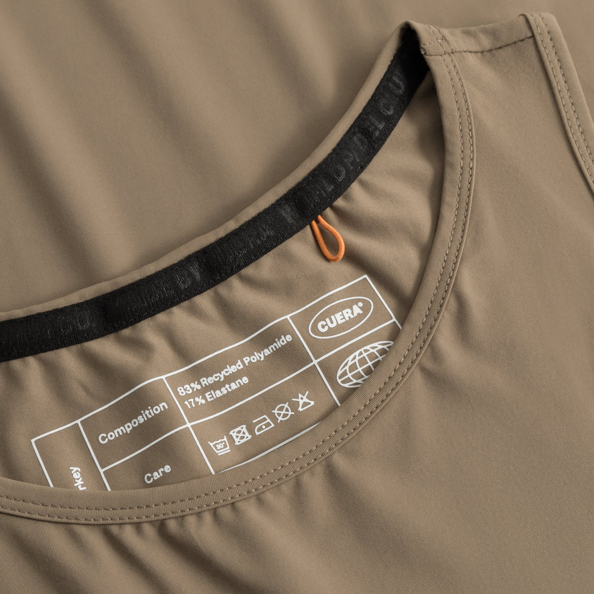 Cuera Oncourt Cropped Tank Top in Walnut, neck label and care tag detail
