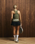 Model wearing Cuera Oncourt Cuera Airy Tank Top in Army, back studio view