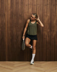 Model wearing Cuera Oncourt Cuera Airy Tank Top in Army, front studio view