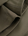 Cuera Oncourt Cuera Skirt 2-in-1 in Army, neck label and care tag detail