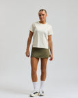 Model wearing Cuera Oncourt Cuera Skirt 2-in-1 in Army, close-up detail on model
