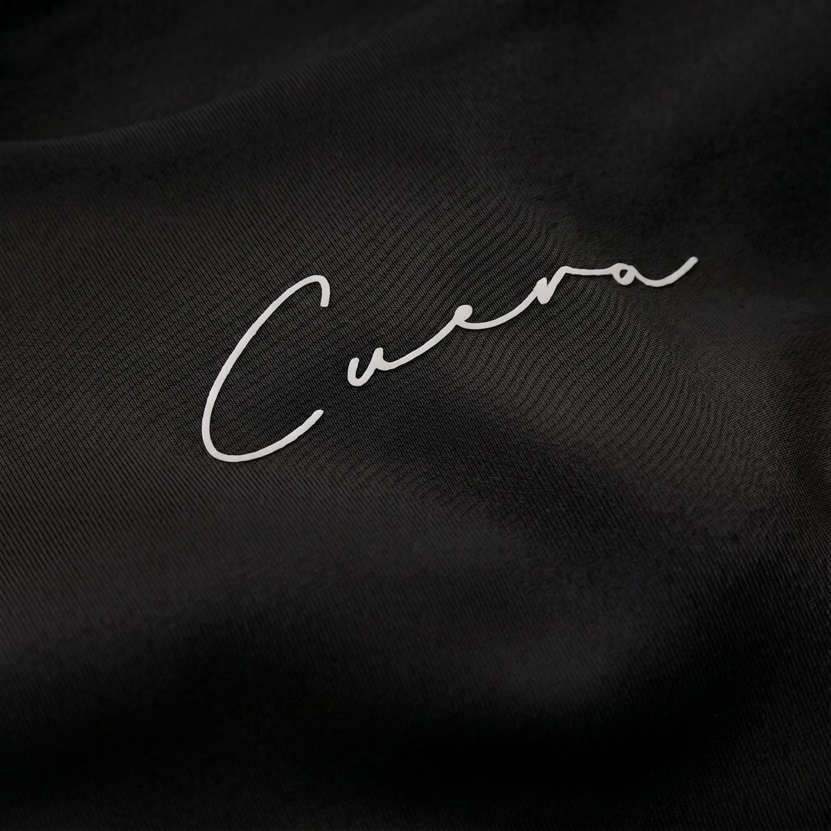 Cuera Oncourt Soft Bra Top in Black, logo print detail