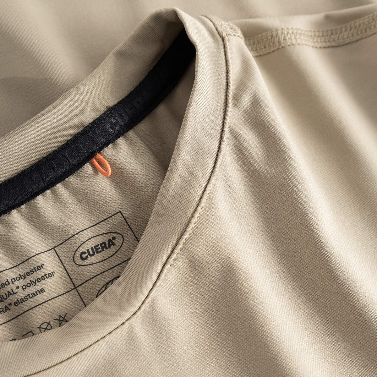 Cuera Oncourt LS Layer T-Shirt in Sand, neck label and care tag detail