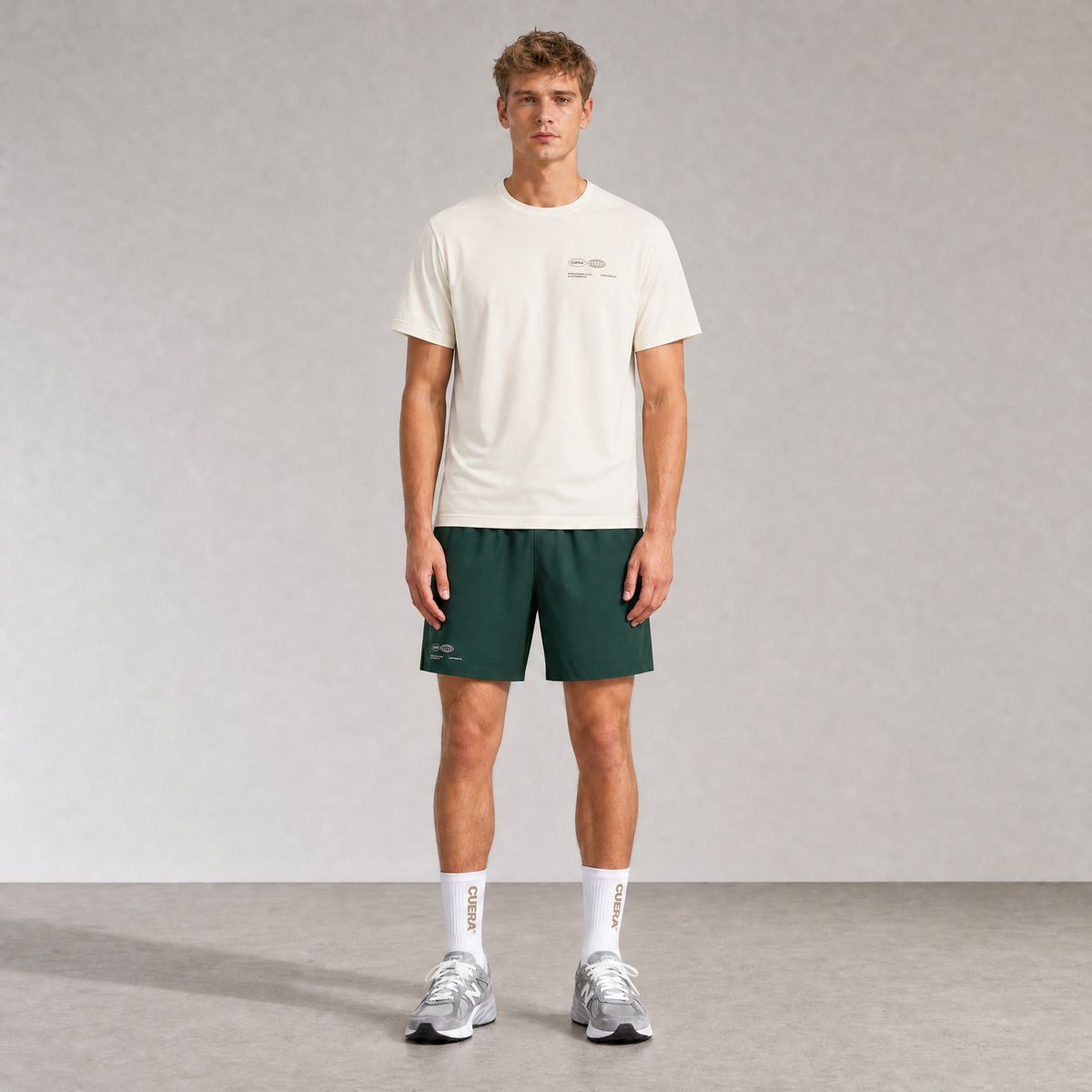 Model wearing Cuera Oncourt Shorts & T-shirt in Court Green & Off White, front studio view