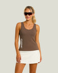 Model wearing Cuera Oncourt Slim Tank Top & Oncourt Cuera Skirt 2-in-1, front studio view