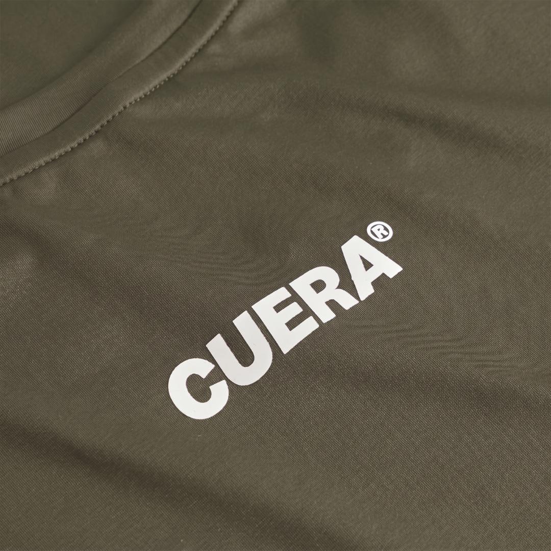 Model wearing Cuera Oncourt Slit Top Light Weight in Army, back studio view