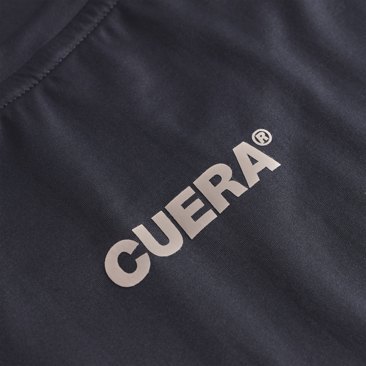 Cuera Oncourt Slit Top SS in Black, logo print detail