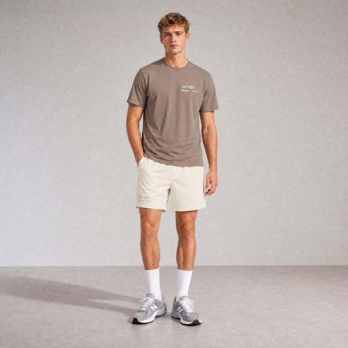 Model wearing Cuera Oncourt Walnut/Off White Uniform Bundle, front studio view